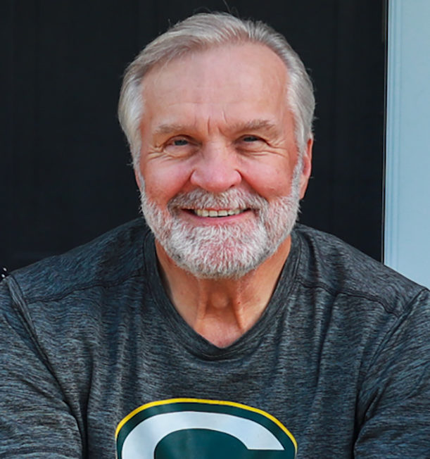 Ted Kuczynski posing for a headshot.