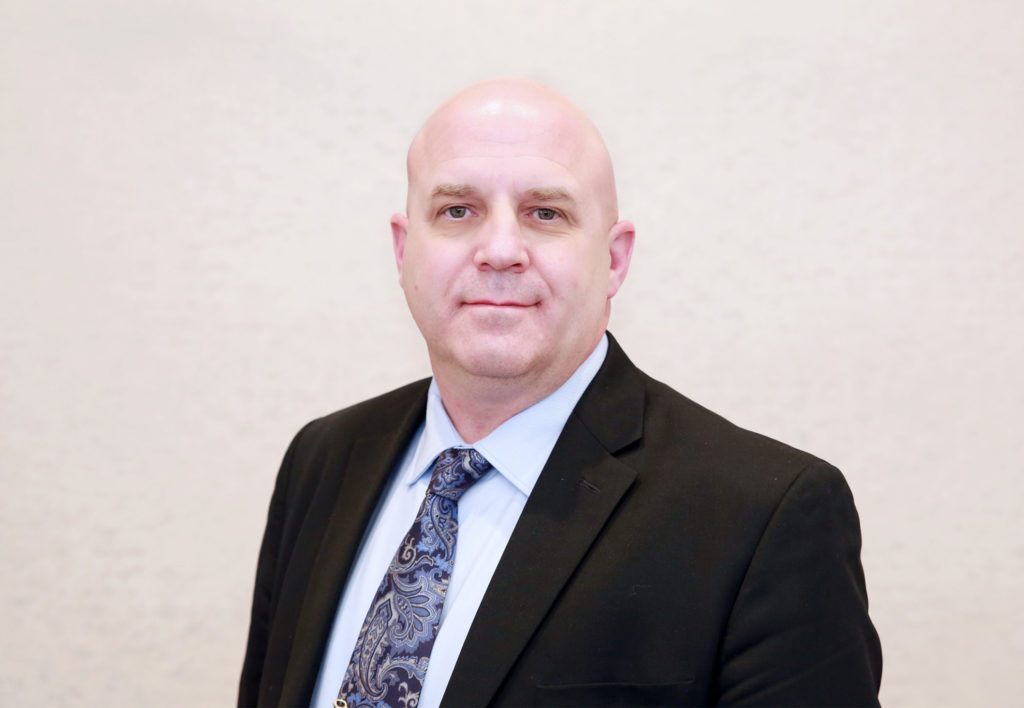 Headshot of Ron McGuire