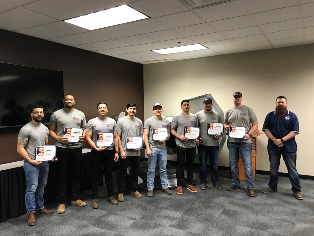 27th SMART Heroes class posing for a picture